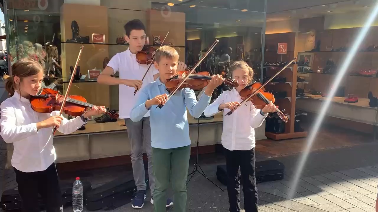 Talented young street violinists