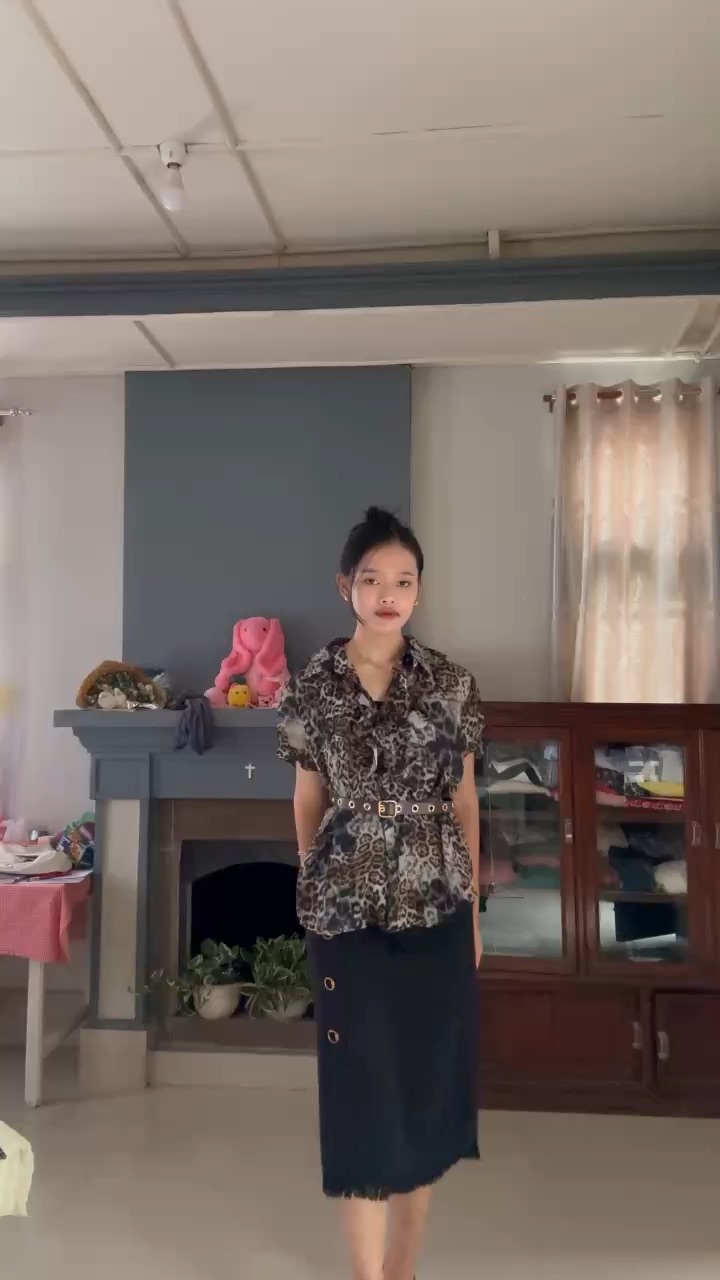 Wearing a leopard print tops