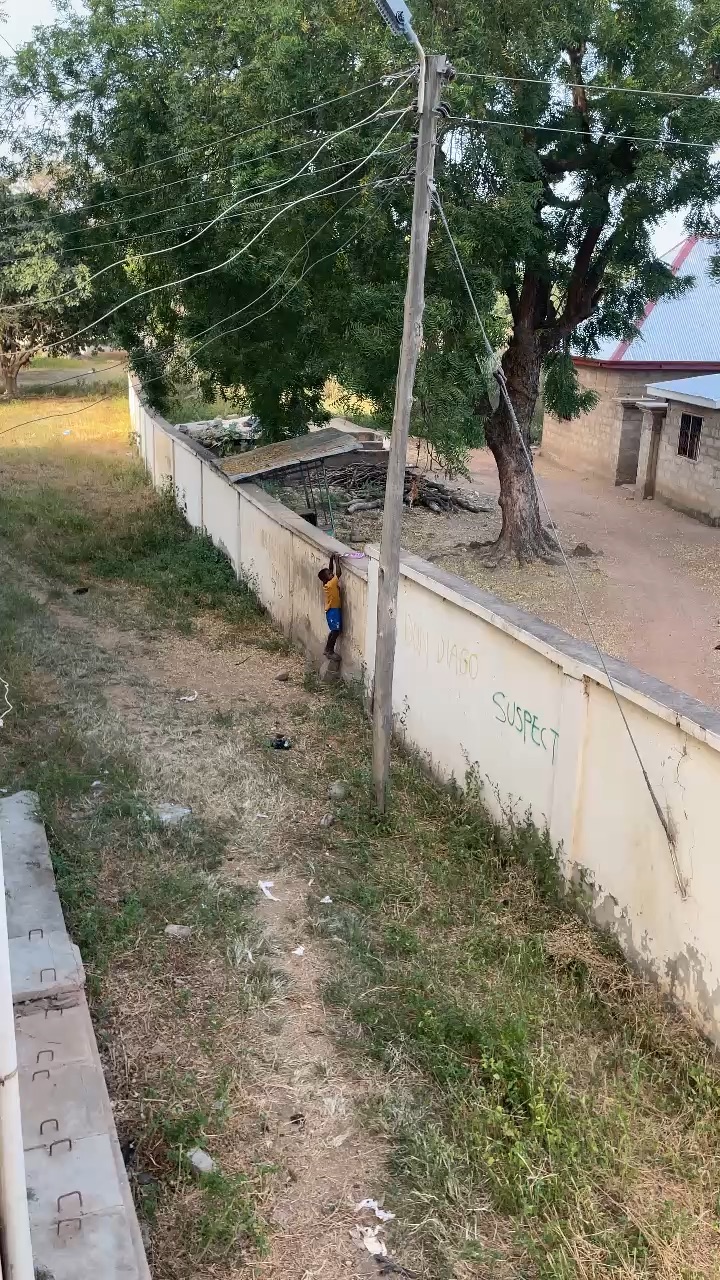 A boy playing in hallways