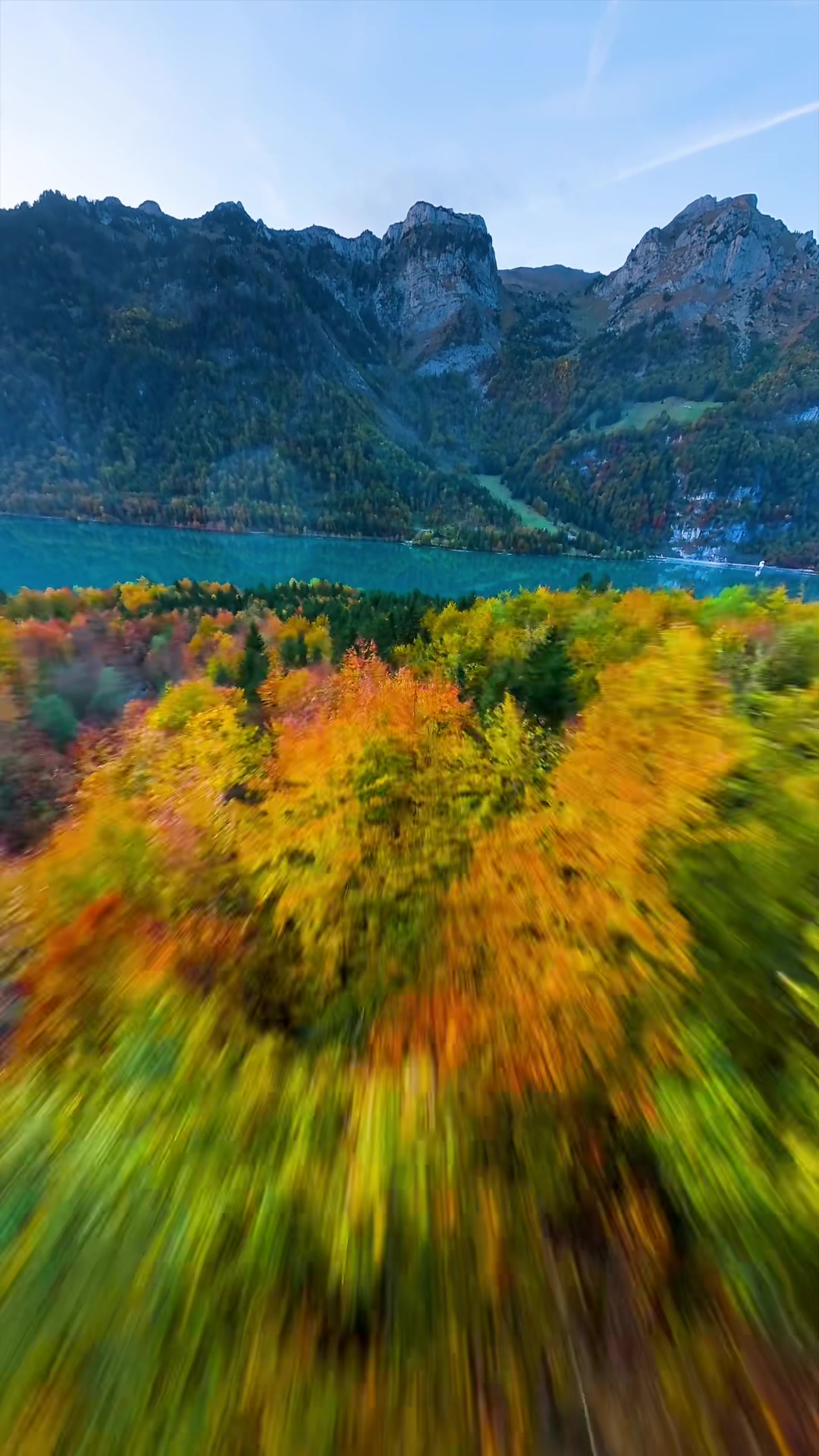 The lake at the end 🥹 It was just getting dark when I discovered this waterfall over the autumn trees in Switzerland...