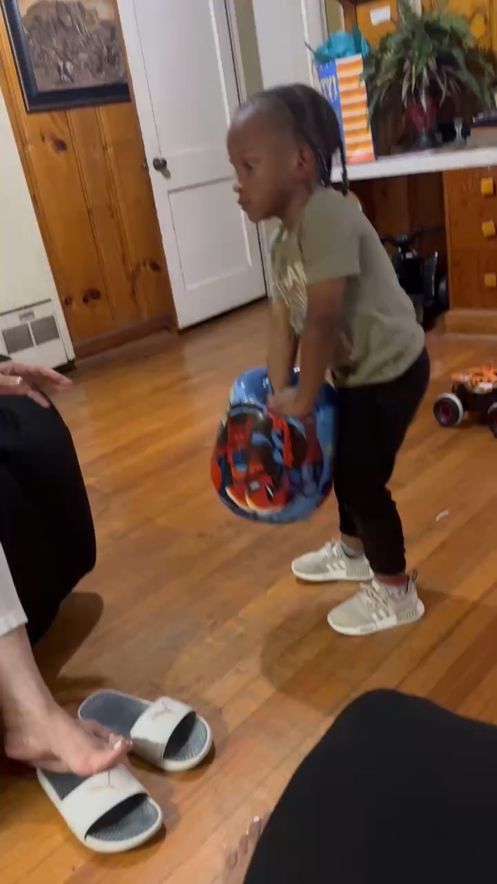 Son tries to take off bubble boxing glove