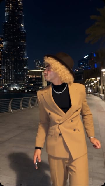 The suit, the confidence, the city lights… i doesn’t follow the vibe, i am the vibe. 😮‍💨🔥 Would you rock this look?