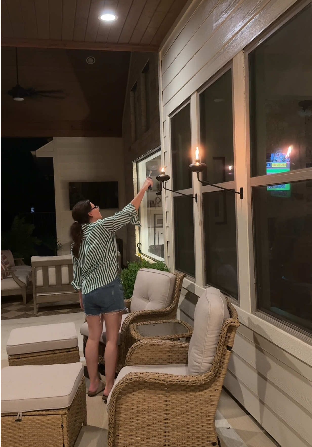Back porch glow up ✨ i’m in love with these tiki torches that are wall mounted. I had to share! #backporch #outdoorli...