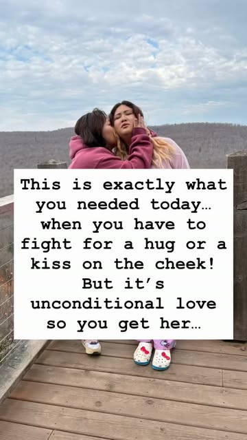 The joy of being a mom. You have to fight for a hug or kiss, but you love them unconditionally so you get her two cat...