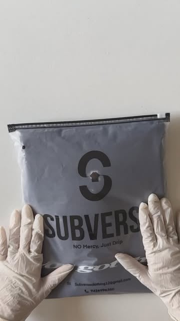“Unwrapping boldness. Every detail, every thread, a statement of rebellion. 🌐 #Subverse #ASMRpackaging #StreetwearUn...