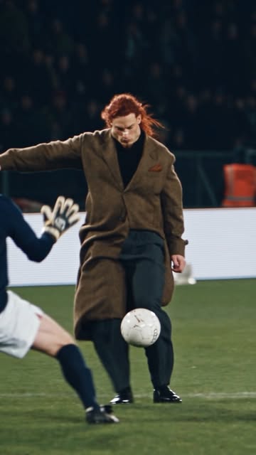 They told me the houndstooth suit wasn't appropriate for the pitch. Then I remembered I have Özil’s left foot. ⚽️🥊 #...