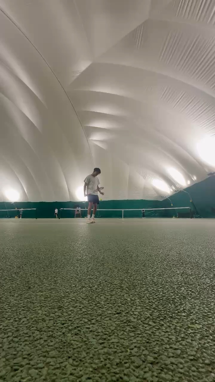 Me playing tennis