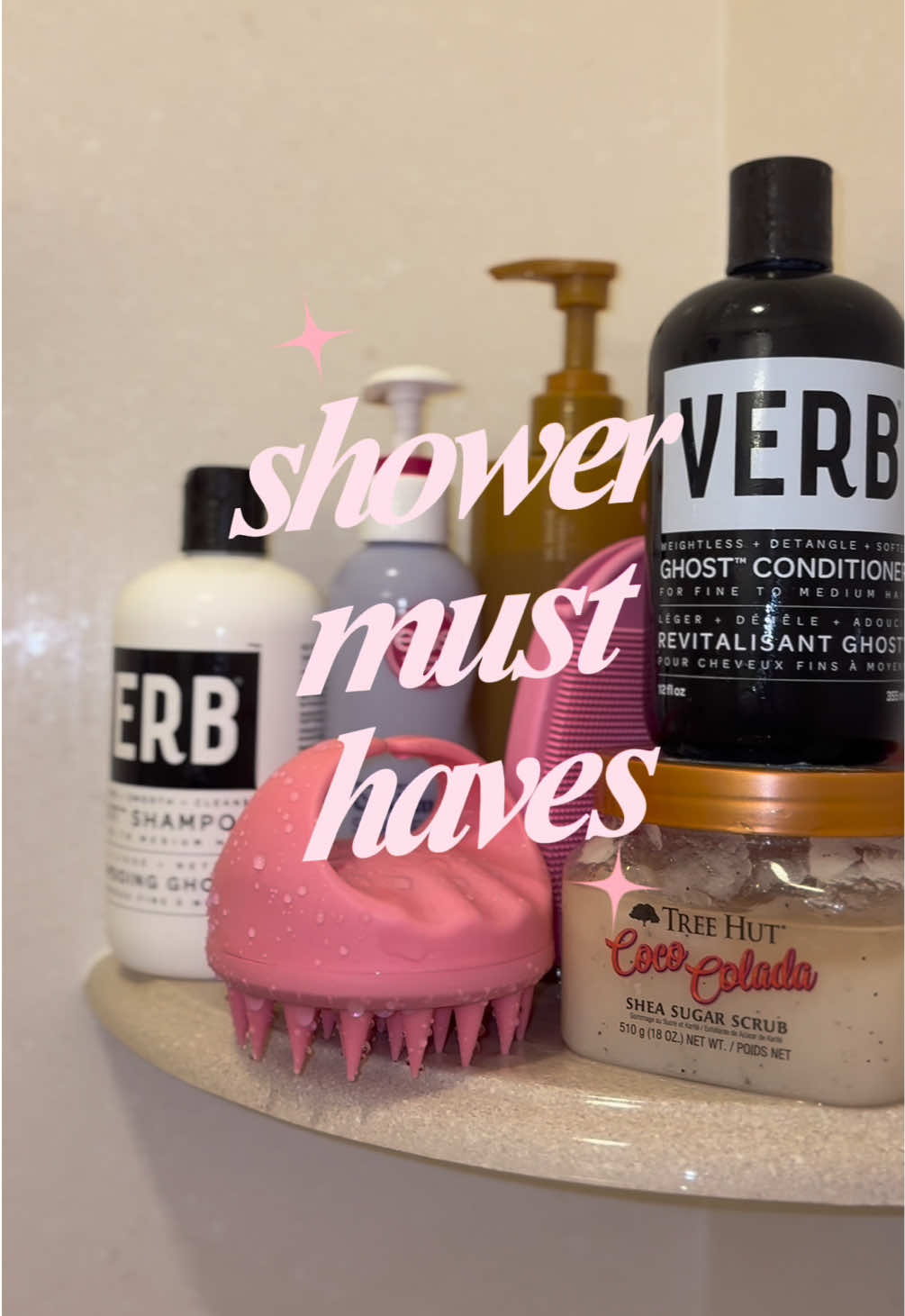 some of my shower staples! bliss silicone scrubber, cyklar vanilla body wash, eos vanilla cashmere shave oil, tree hu...