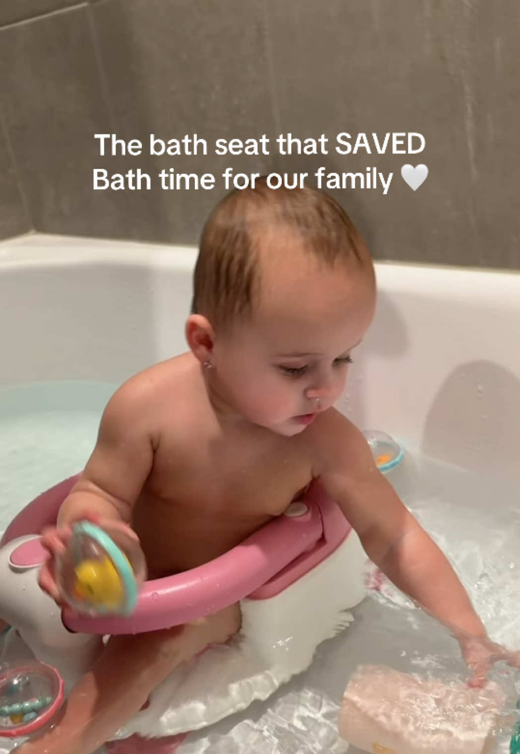 This bath seat SAVED bath time for us. My baby was starting to really hate being in her lay back infant tub and this...