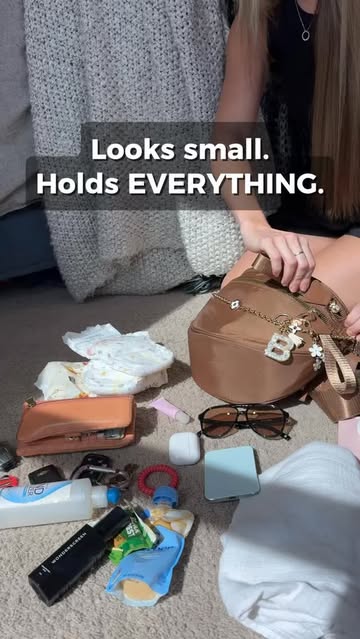 Looks small. Holds EVERYTHING. 😂 Somehow all the little things I need for myself + mom life fit inside my @emmafy.of...