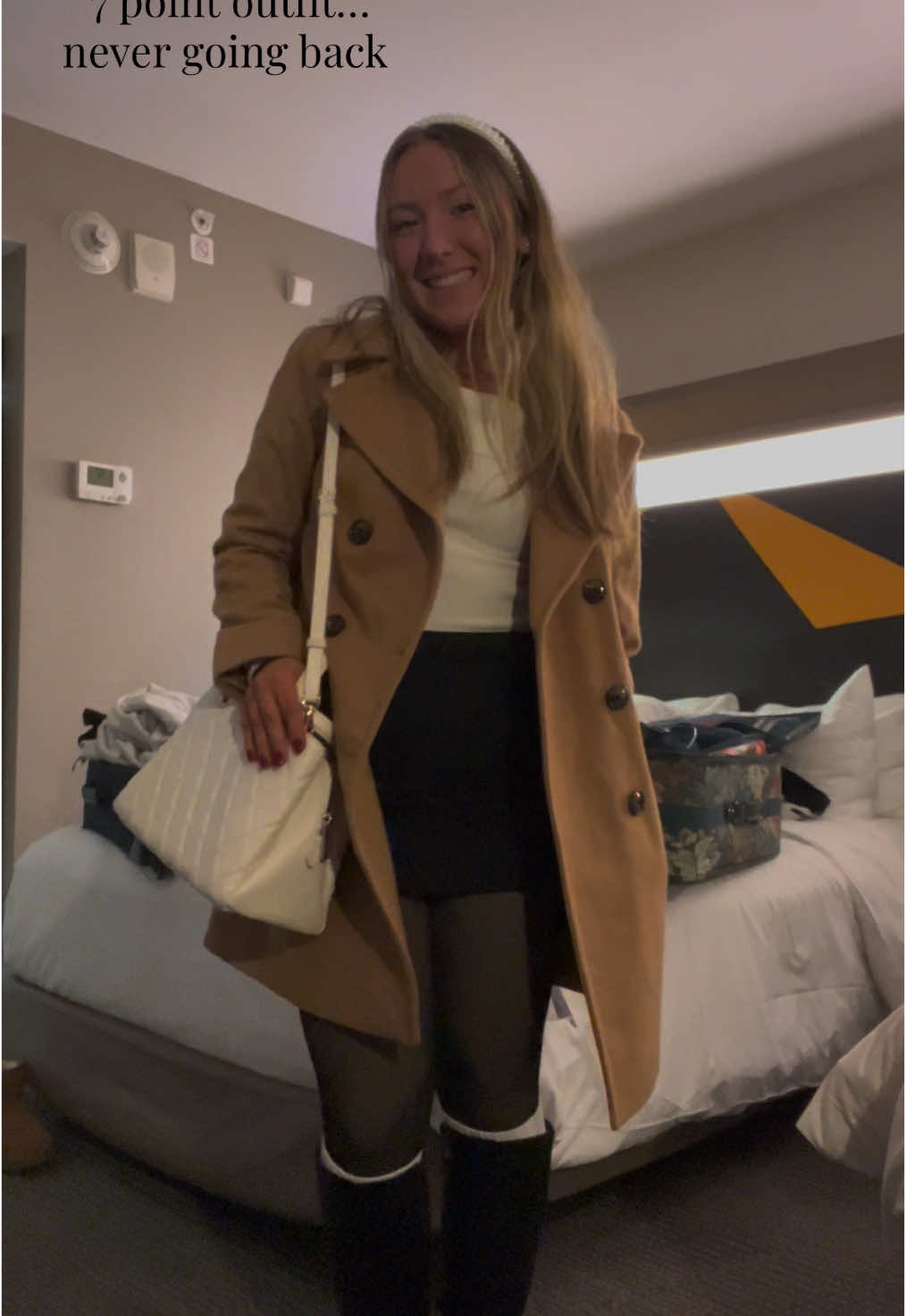 7 Point Outfit Breakdown: 1: Tights 2: Sweater 3. Skirt 4. Leg warmers/boot socks 5. Boots 6. Coat 7. Purse (Jewelry...